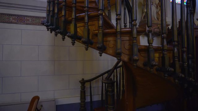 Tracking Shot of Loretto Chapel Staircase in Santa Fe, New Mexico -Tilt Up 1-