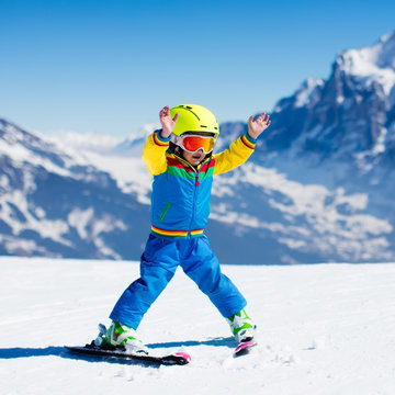 Little child skiing in the mountains
