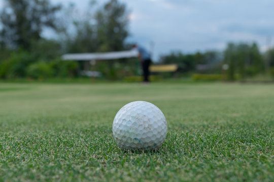 Golf ball on green