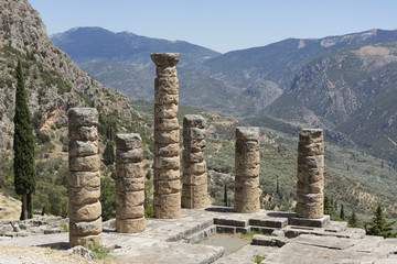 Fototapeta na wymiar Mountainous landscape with antique ruins of the temple of Apollo