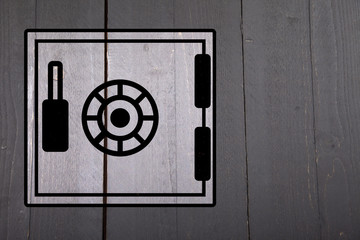 Illustration of a safe on black wooden background