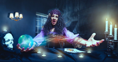 Crazy sorceress practising witchcraft