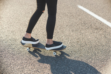 skateboarding girls legs at skatepark