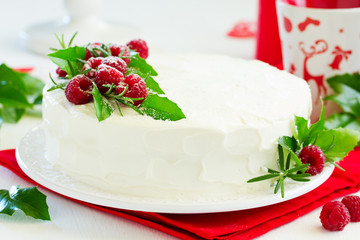 New Year or Christmas cake with raspberries, selective focus.