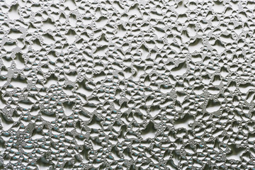 Condensation mirror, Water drops from home condensation on a window.