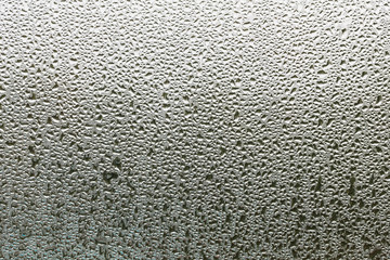 Condensation mirror, Water drops from home condensation on a window.