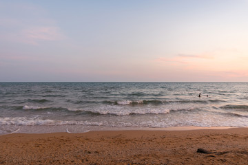 Fototapeta na wymiar Sunset at a beach and sea