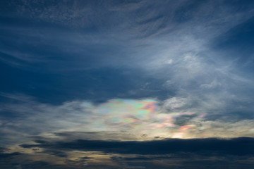 Fototapeta premium Iridescent pileus cloud at during sunset, rainbow clouds backgro