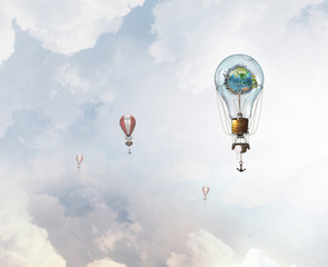 Aerostats flying high . Mixed media