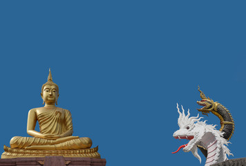 Abstract soft focus the big Buddha and symbol of Phaya Nagas with blue sky background in Thailand.This is public domain made from donation money from people in the village.