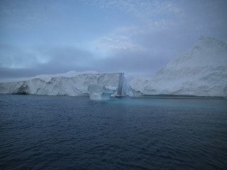 beautiful icebergs are melting on arctic ocean