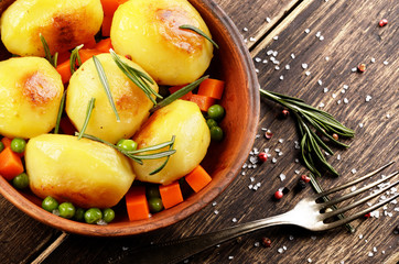 Boiled and baked potato and vegetables