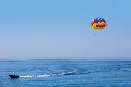 Parasailing in a blue sky in Alanya