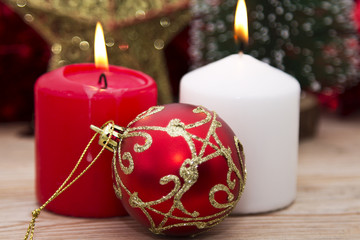candles with Christmas decorations