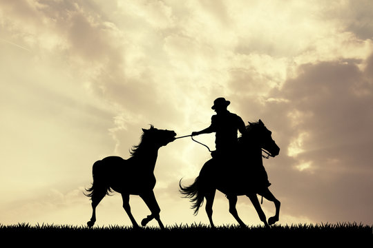 man horseback at sunset