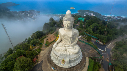 Fototapeta premium Big Buddha statue Was built on a higt hilltop of Phuket Thailand Can be seen from a distance.