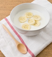 Bowl of Homemade Yoghurt with Ripe Banana