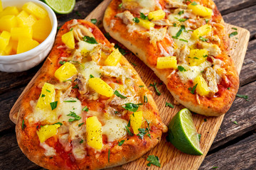 Homemade hawaii Flatbread Pizza with chicken and pineapple dressing yogurt sauce.