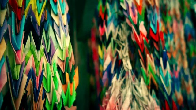Thousand Origami Cranes at Nanzoin buddhist temple. Point of view close up colorful background. 2016