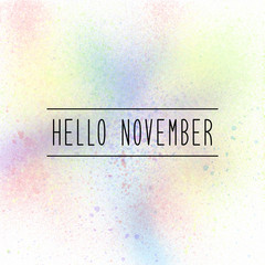 Hello November text on pastel spray paint background