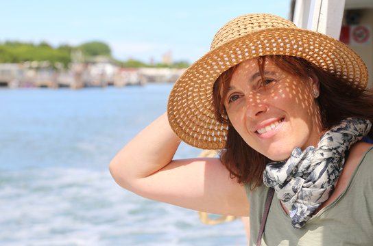 Cute Forty Year Old Woman With Straw Hat