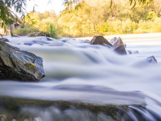 Obraz na płótnie Canvas Small river in the autumn season