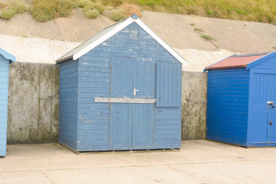 Blue painted beach hut