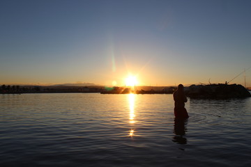 Naklejka premium fishermen on the rocks