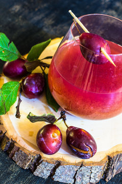 Plum juice and fresh plums