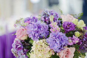A stunning bouquet made of lilacs and roses
