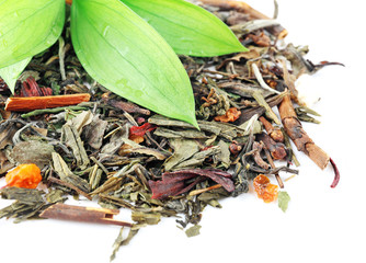 Assortment of dry tea on white background