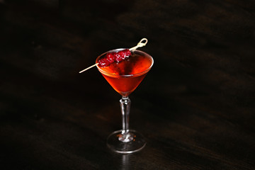 Tasty long drink on wooden table