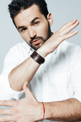 A handsome young man shows emotions