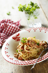 Pasta bolognese with minced meat and tomato sauce
