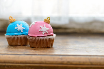 Christmas cupcakes on windowsill