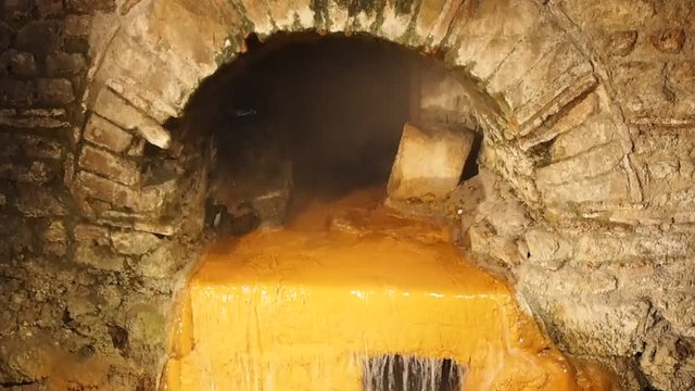 The Sacred Spring at the Roman Baths ancient spa in Bath, UK