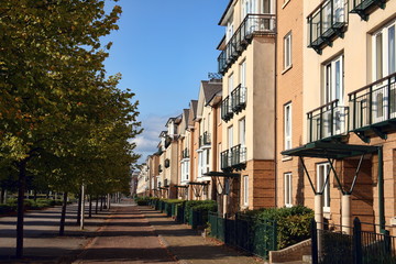 Fototapeta na wymiar Modern new terraced houses and apartment flats in Cardiff, Wales, UK