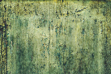 Rough textured surface of old green wooden plank