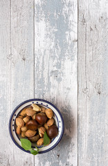 mix nuts on old wooden table