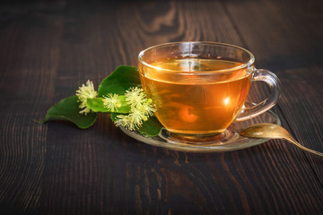 Linden tea in a glass cup.
