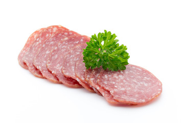 Salami smoked sausages slices isolated on white background.