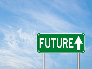 Green transportation sign with future wording and arrow on blue