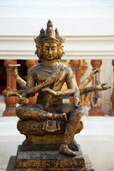 Hindu god Brahma gold shabby old statue in Thailand. Beautiful Indian religion traditional lord sculpture
