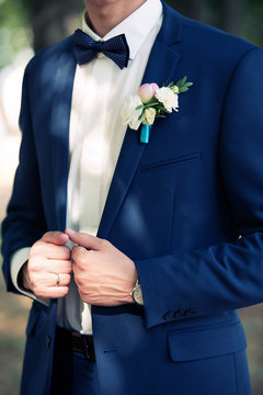classical suit of the groom and buttonhole