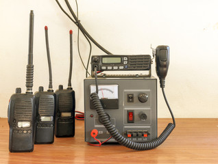 hand of Amateur radio holding speaker and press for radio communication theme