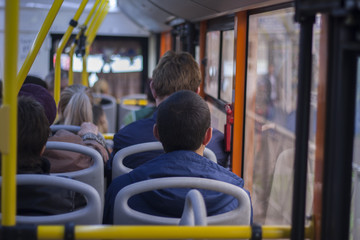 Fototapeta na wymiar people sitting in public transport