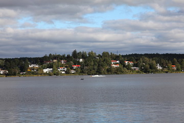 Naklejka premium Houses on the lake shore,Sigtuna,Sweden