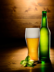 Glass and bottle of beer