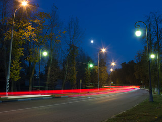 Night road, illuminated by street lamps