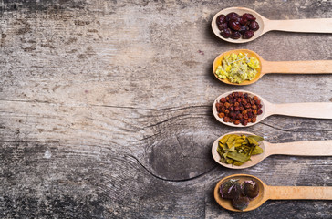 Herbs in wooden spoon